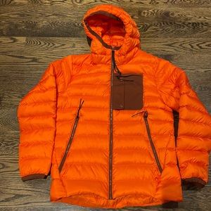 Men’s small orange puffer jacket
